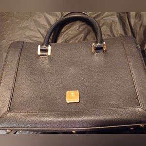 MCM Luxury Black Genuine Leather Authentic Bag with Gold Accents